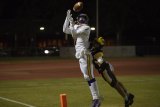 Lemoore's Will Schalde scored on a Justin Holaday TD pass with seconds left in the first half to help lead the way in the Tigers 36-29 victory over Golden West Friday night in Visalia.